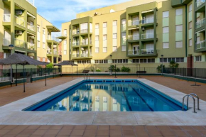 Bonito apartamento en la playa con piscina